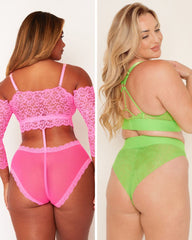 Two women wearing pink and green lingerie sets on a plain background