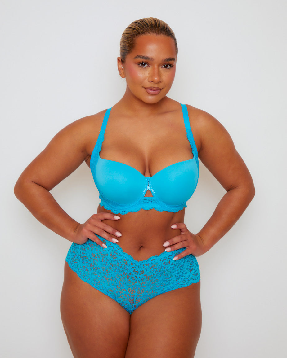 Front view of the Daley Lace T-Shirt Bra and lacec short in Bluebird Blue featuring smooth moulded cups, delicate floral lace detailing, and a subtle keyhole accent at the centre front. The matching lace thong completes the elegant everyday lingerie set.