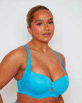 Close-up view of the Daley Lace T-Shirt Bra in Bluebird Blue, highlighting the smooth moulded cups, feminine floral lace accents, and centre-front keyhole detail for a refined finish.