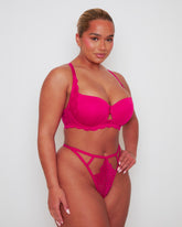 Side profile of the Daley T-Shirt Bra and Portia Thong in Very Cherry, highlighting the smooth silhouette of the moulded cups, elegant lace side panels, and minimal-coverage thong styling.