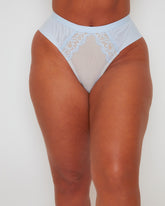 Front close-up of the Tutti Rouge Frankie Brazilian Brief in Ballad Blue featuring soft floral lace, breathable mesh fabric and a smooth, comfortable waistband.