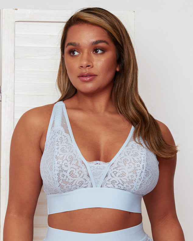 Front view of the Hallie Bralette in Ballad Blue by Tutti Rouge, featuring soft floral lace, sheer mesh panels, a deep V-neckline, and wide supportive bands for a comfortable, feminine fit.
