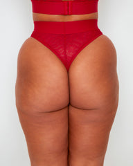 Back view of the Tutti Rouge Julisa Brazilian Brief in Raspberry Red featuring sheer dotted mesh, high-waist waistband and flattering Brazilian cut.