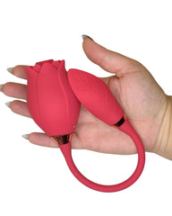 Red tulip-shaped object held in a hand against a white background