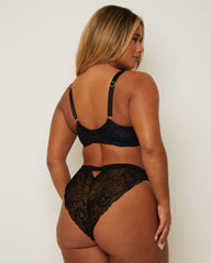 back view of woman wearing a matching bra and brazilian set