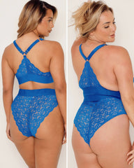 Blue lace lingerie set worn by a model on a plain background