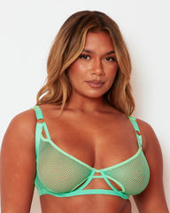 Close-up of the Tutti Rouge Aphrodite Apple Green fishnet bra, showing cut-out cups and gold-tone strap rings.