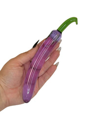 Purple Glass Toy from Brand X By Tutti inspired by the shape and look of an aubergine 