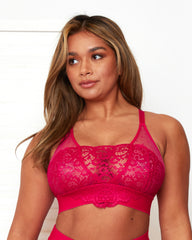 Three-quarter front view of the Beccs Fuller Bust High Coverage Bralette in Very Cherry featuring floral lace cups, sheer mesh neckline, supportive wide underband and a flattering fuller bust fit.