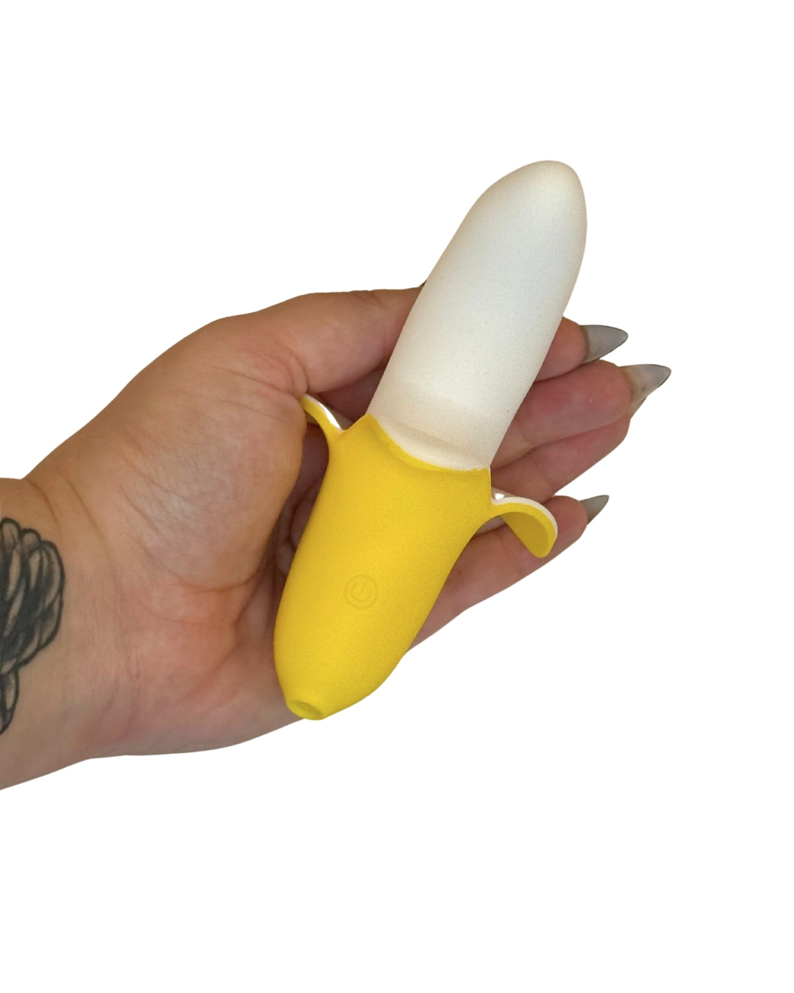 Brand X toys Buzzy Banana multi-speed vibrator showing power button on handle, held in palm