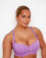 Close-up of Tutti Rouge Daley Lace bra in Amethyst Orchid on a model, showing smooth moulded cups, lace trim and centre cut-out.