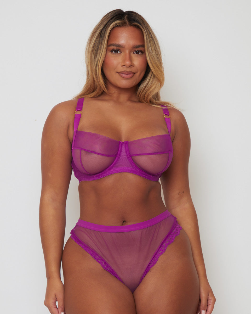 Studio image of the Tutti Rouge Raya Sheer Balcony Bra and matching briefs in Vamp Purple, sheer fuller bust lingerie set with supportive balcony bra for DD+ sizes.
