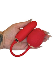 Red silicone Brand X product held in a hand with a white background
