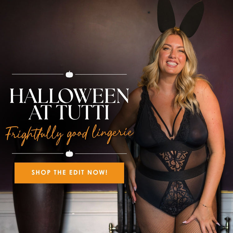 Tutti Rouge Halloween banner featuring a black lace bodysuit styled with bunny ears and fishnets. Frightfully good lingerie. Shop the edit now.
