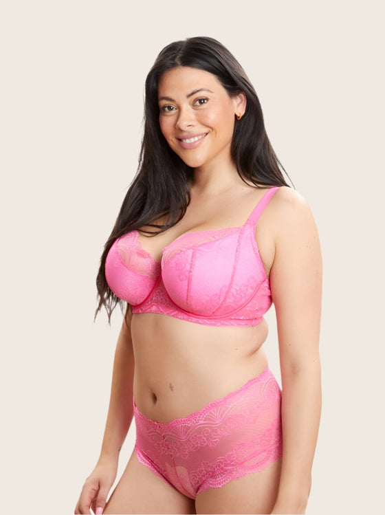 side profile showing forward projection of neon pink bra set