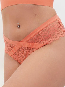  A low V Cut front brief in a coral colour.  A high-rise back to ensure all day comfort and support. Available in sizes XS - 6XL. Plus size lingerie. 
